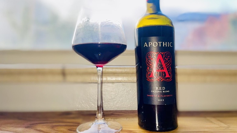 Bottle and glass of Apothic Red Blend