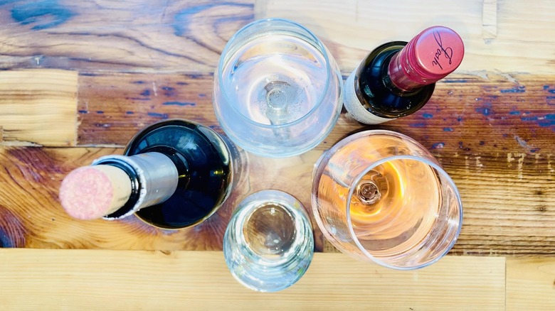 Overhead view of glasses and bottles of wine