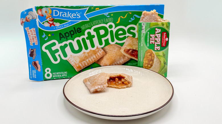 Drake's apple pies and Aldi apple pie on white surface