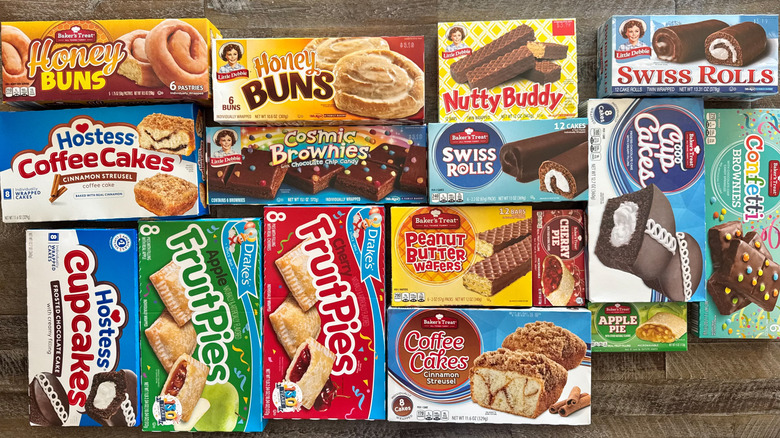 Snack cake boxes on wooden background