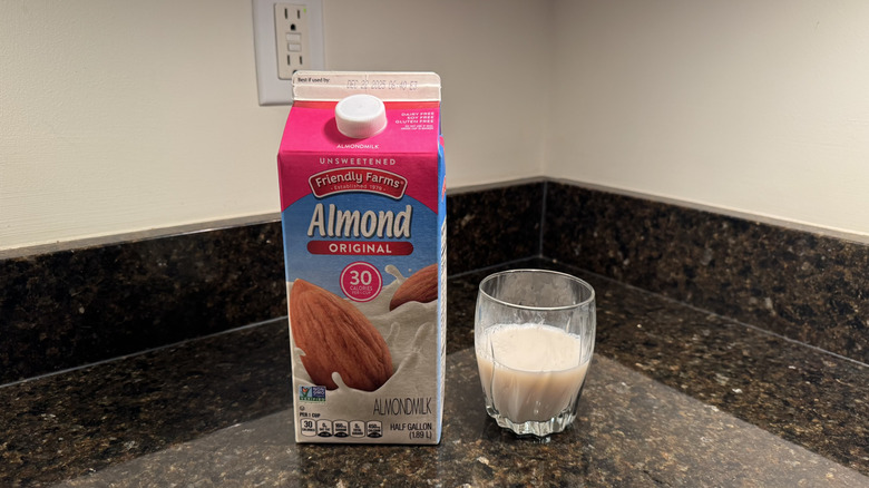Friendly Farms unsweetened almond milk in glass