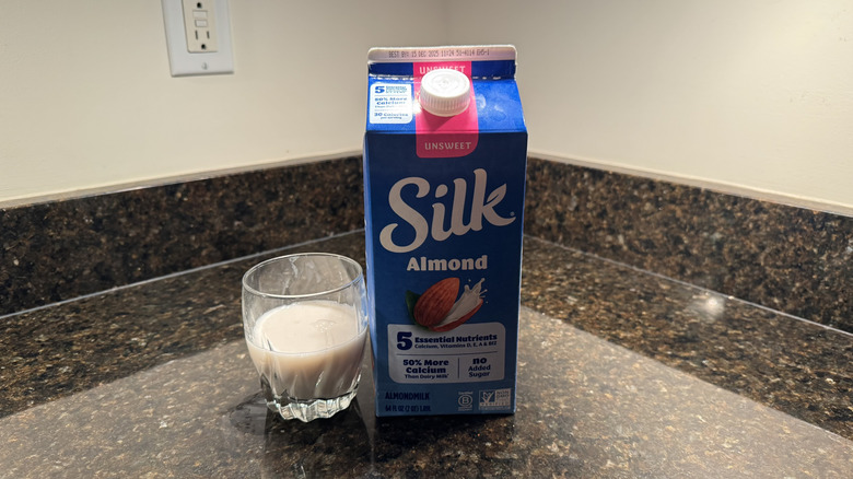 Silk unsweetened almond milk in a glass
