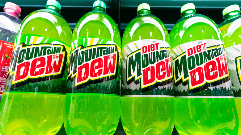 Bottles of Mountain Dew and Diet Mountain Dew on a shelf