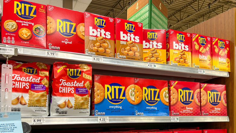 Shelves of various Ritz Cracker products at a grocery store