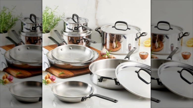 KitchenAid stainless steel cookware on a white countertop
