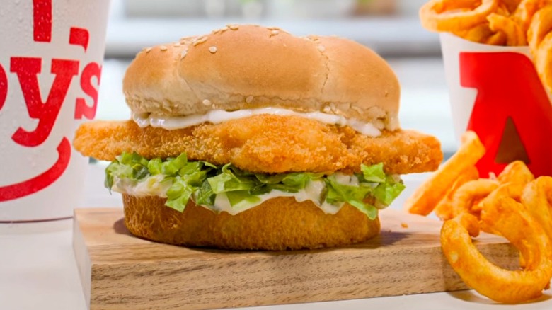 Arby's fish sandwich and curly fries and drink