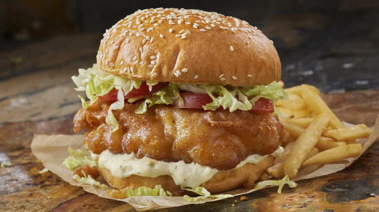 Fried fish sandwich with fries