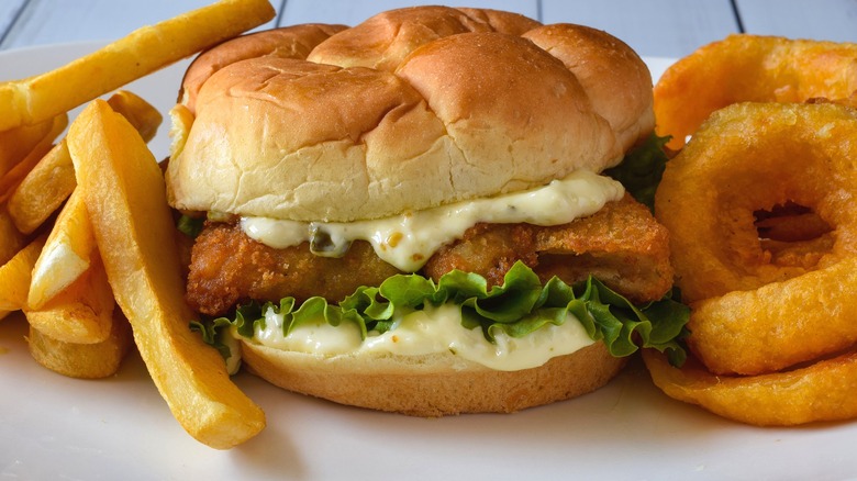 Fried fish sandwich with two kinds of fries