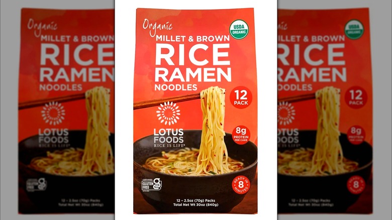 a package of Lotus Foods Organic Millet & Brown Rice Ramen on a white background
