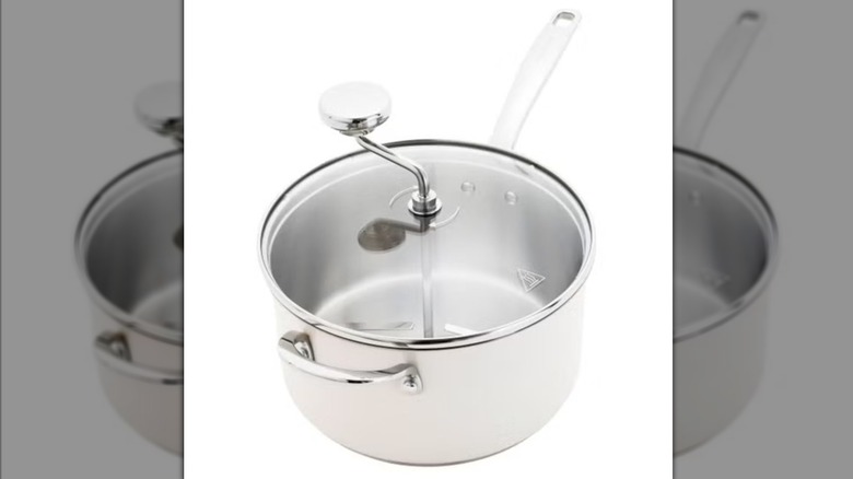 A cream-colored pot 2 with a clear glass lid.