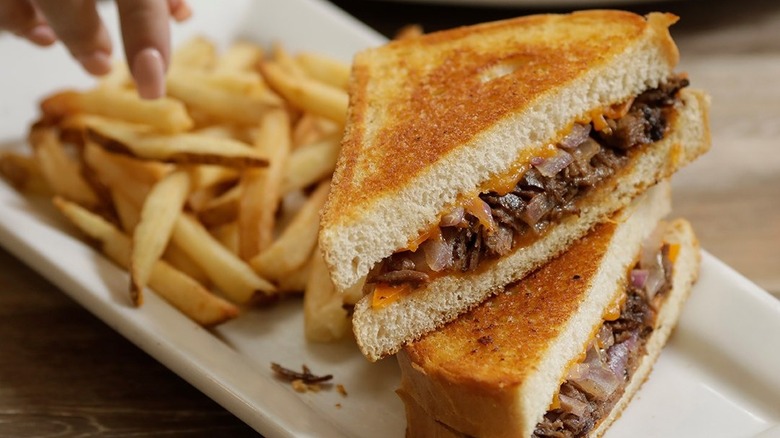 A pot roast melt sandwich with fries at Perkins