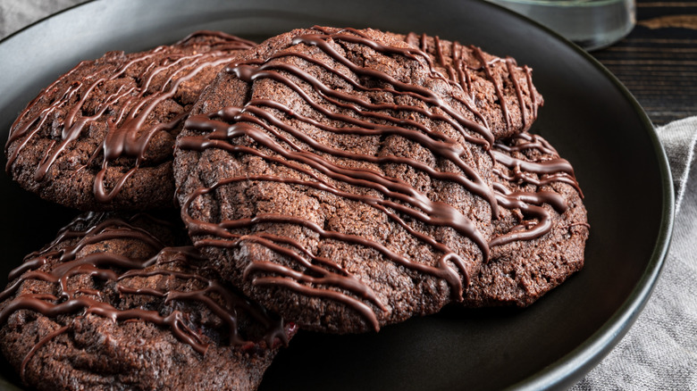 A plate of fudgy triple chocolate cookies