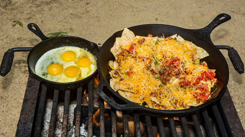 Campfire Huevos Rancheros cooking over hot coals