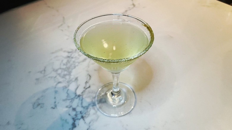 The Heatwave Martini from Bonefish Grill on a marble background