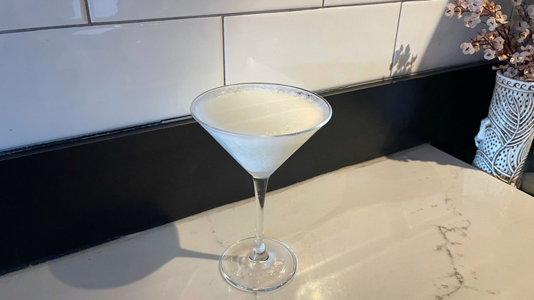 The Key Lime Martini from Bonefish Grill on a marble background