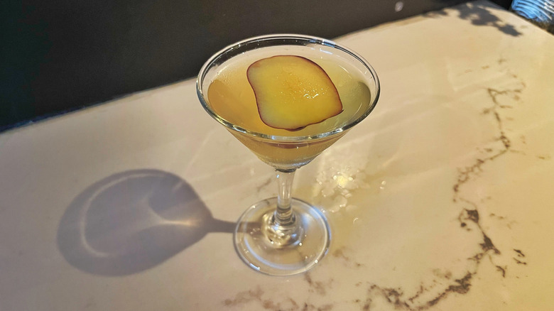 The Apple Martini from Bonefish Grill on a marble background