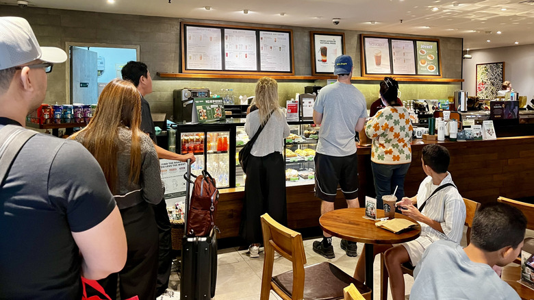 Long line in a Starbucks coffee house