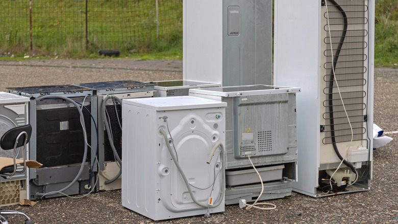 Secondhand appliances outdoors at a flea market