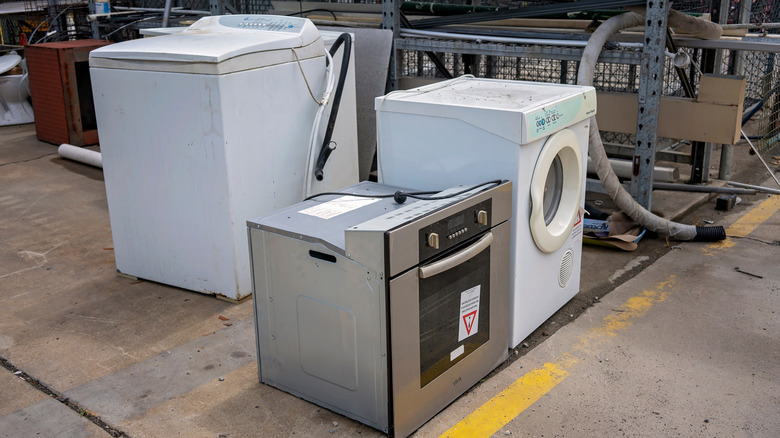 Thrifted appliances sitting outside