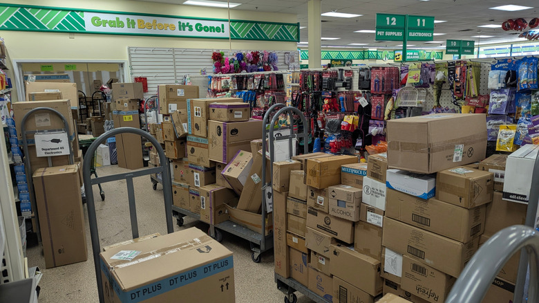Boxes of unpacked inventory at Dollar Tree