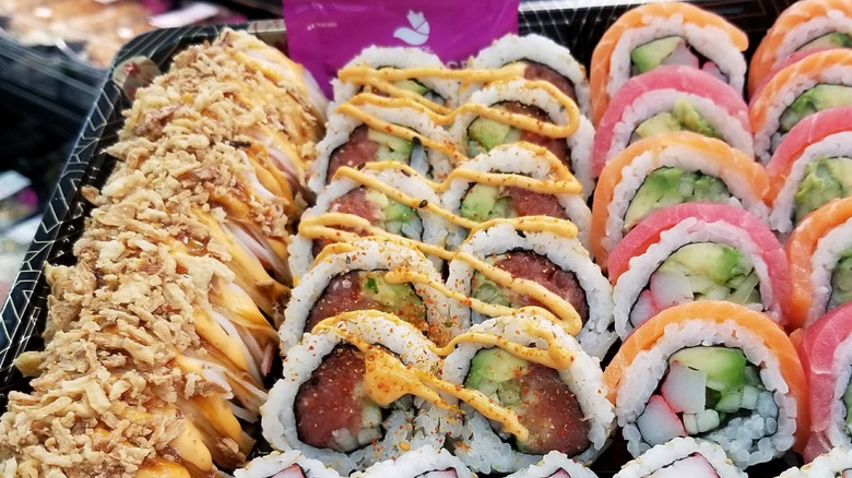 a variety of rolls on a plastic platter from Sam's Club
