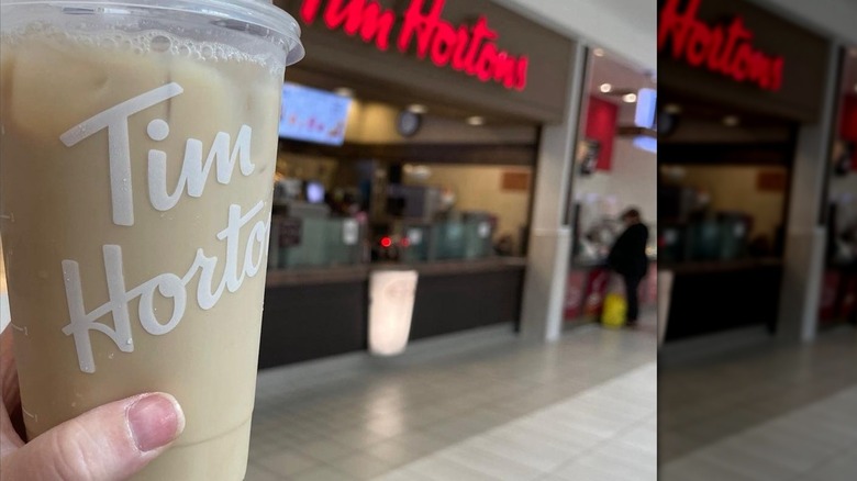 Person holding iced chai