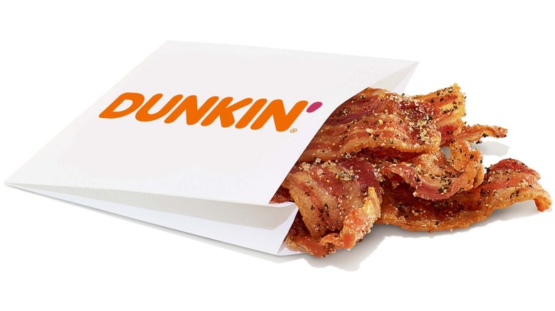 White sleeve of Dunkin' Snackin bacon on white background