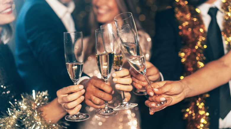 People toasting with Champagne during a holiday celebration