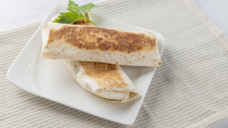 Two grilled burritos