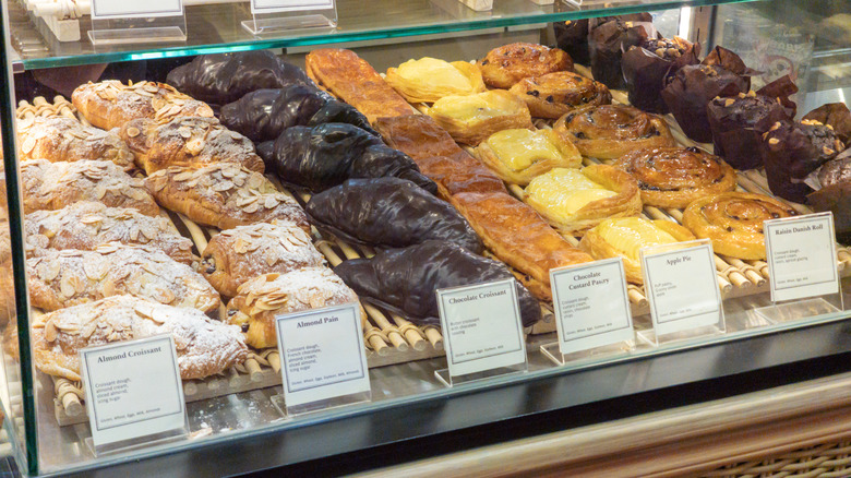 fresh pastries in a bakery display case