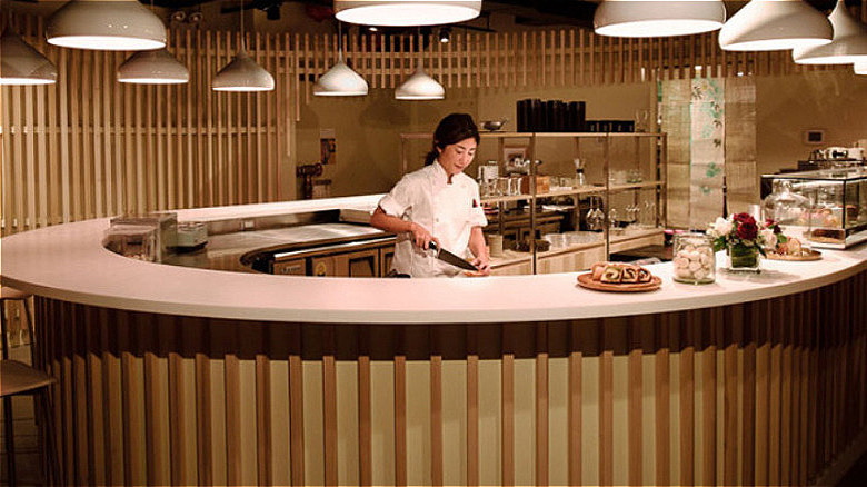 Baker cutting at Patisserie Tomoko counter