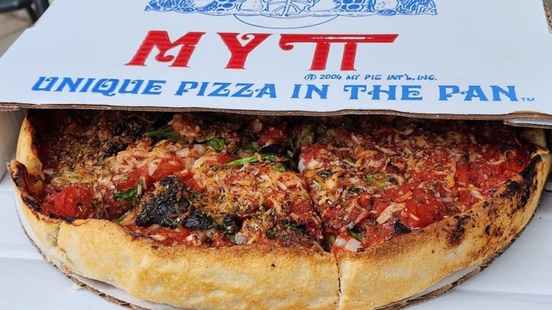 A deep dish pizza from My Pi pizza in a box