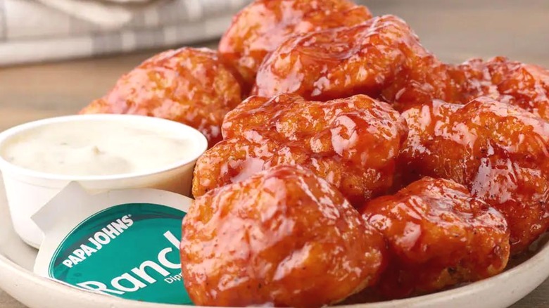 Glazed boneless chicken wings with dip