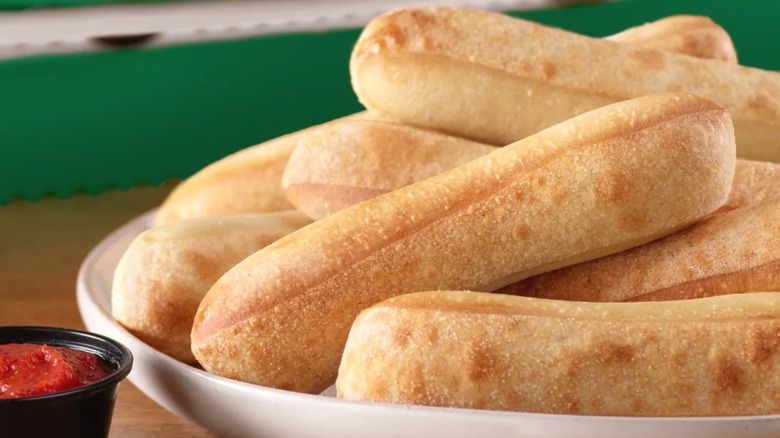 Plain breadsticks with marinara sauce