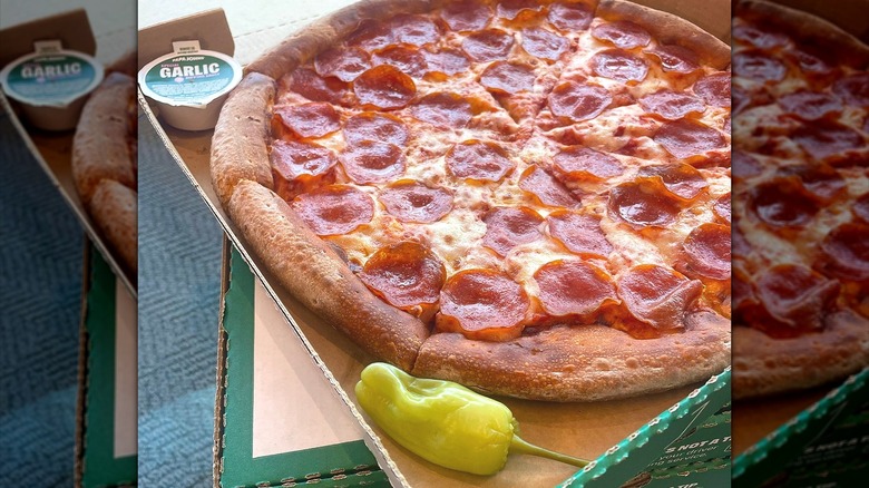 Takeout pepperoni pizza in box