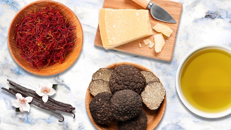 Expensive ingredients, including truffles and saffron, on a table