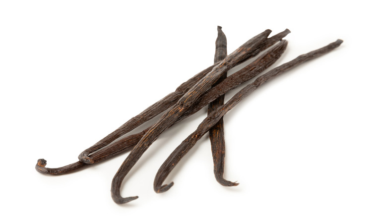 Vanilla bean pods on a white background