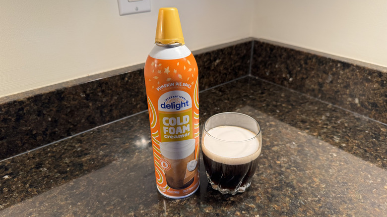 Pumpkin spice cold foam with glass of coffee