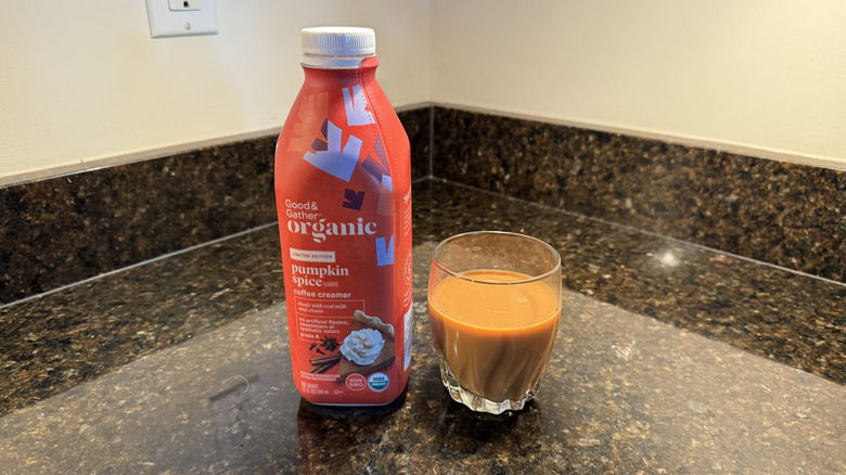 Good & Gather pumpkin spice coffee creamer and glass of coffee