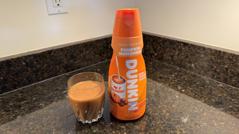 Dunkin' coffee creamer with glass