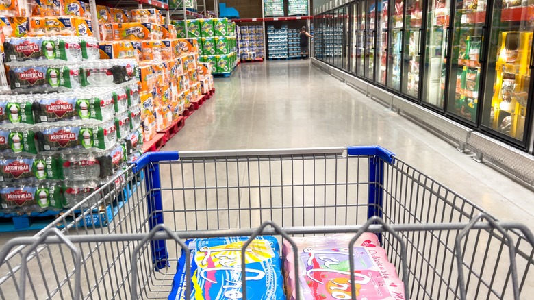 a shopping cart in an aisle at Sam's Club