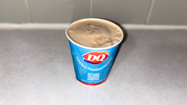 A vanilla Blizzard with coffee syrup and Heath pieces mixed in.