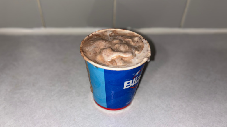 A chocolate colored Blizzard with a vanilla swirl