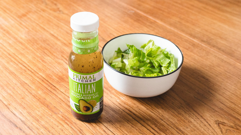 Primal Kitchen italian dressing with lettuce bowl
