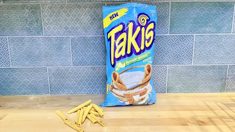 Bag of Takis Buckin' Ranch with chips alongside