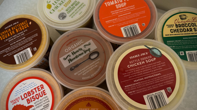 An overhead view of various Trader Joe's soup cartons