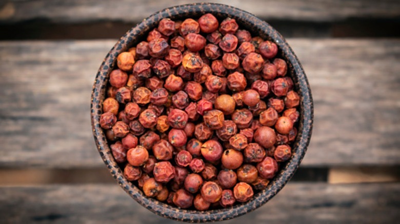 Red peppercorns in a bowl