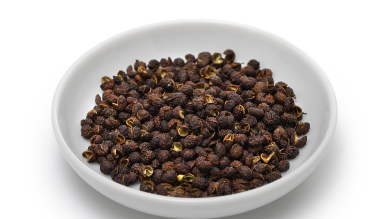 Timut peppercorns in a white bowl