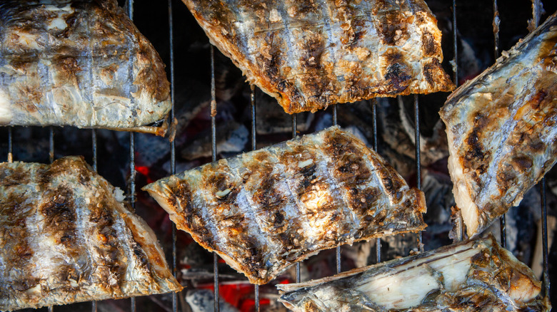 grilled swordfish slices on a bbq