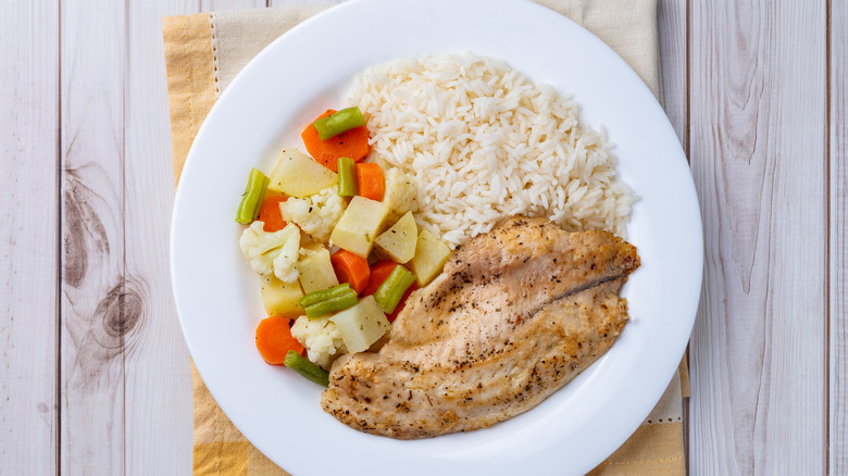 grilled tilapia on plate with